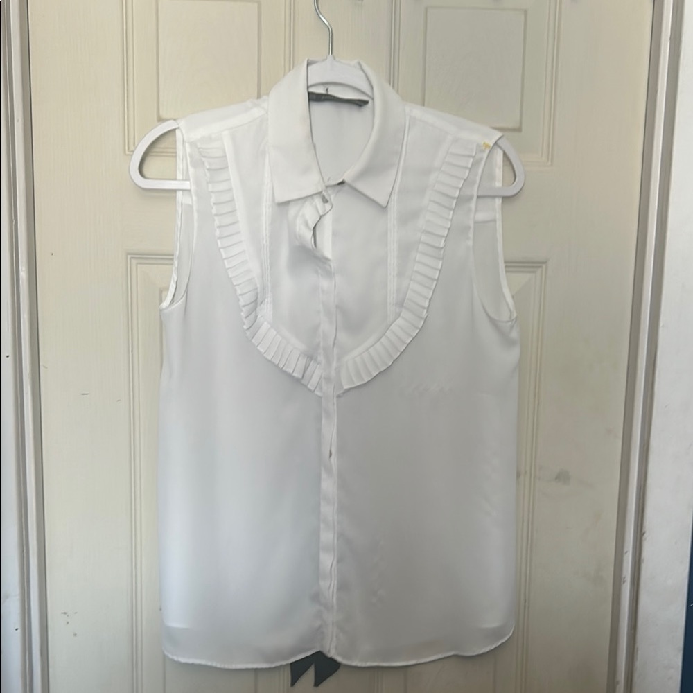 White Sleeveless Ruffled Blouse with Bib Collar